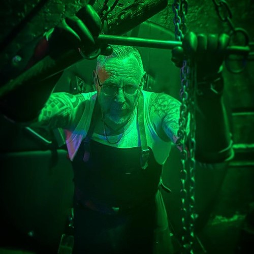 Mr Cage male fetish Dominatrix photoshoot in The Penitentiary at the fetish Studio in Derbyshire